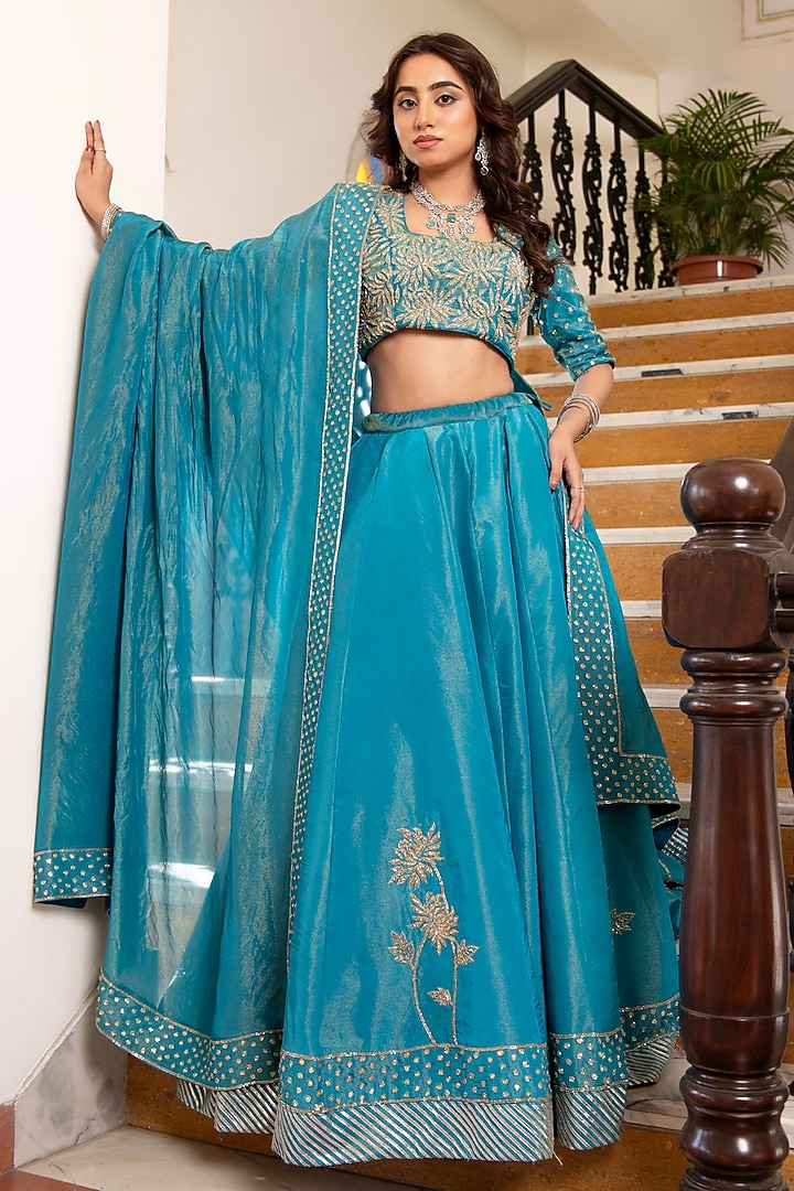 Blue Cosmos Silk Hand Embroidered Wedding Lehenga Set by Pomcha Jaipur at Pernia's Pop Up Shop
