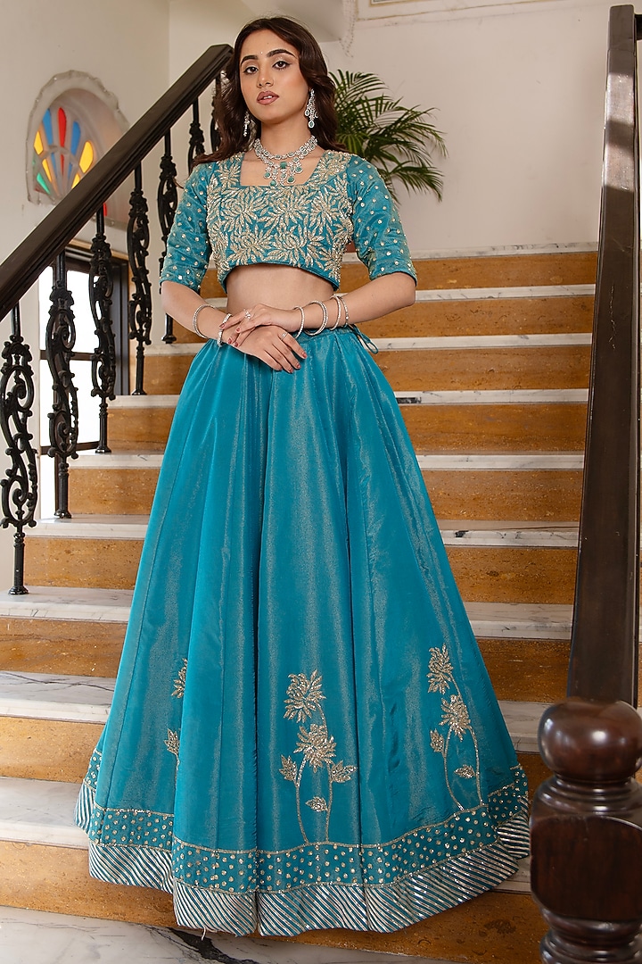 Blue Cosmos Silk Hand Embroidered Wedding Lehenga Set by Pomcha Jaipur at Pernia's Pop Up Shop
