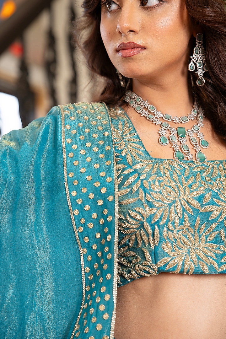 Blue Cosmos Silk Hand Embroidered Wedding Lehenga Set by Pomcha Jaipur at Pernia's Pop Up Shop