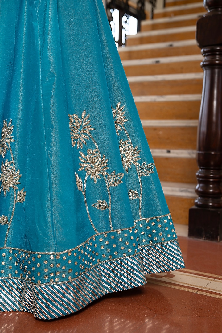 Blue Cosmos Silk Hand Embroidered Wedding Lehenga Set by Pomcha Jaipur at Pernia's Pop Up Shop