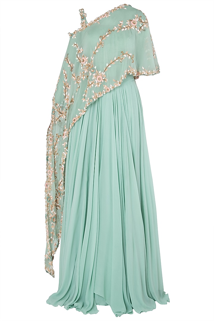 Turquoise asymmetrical embroidered cape with lehenga skirt available only at Pernia's Pop Up Shop.