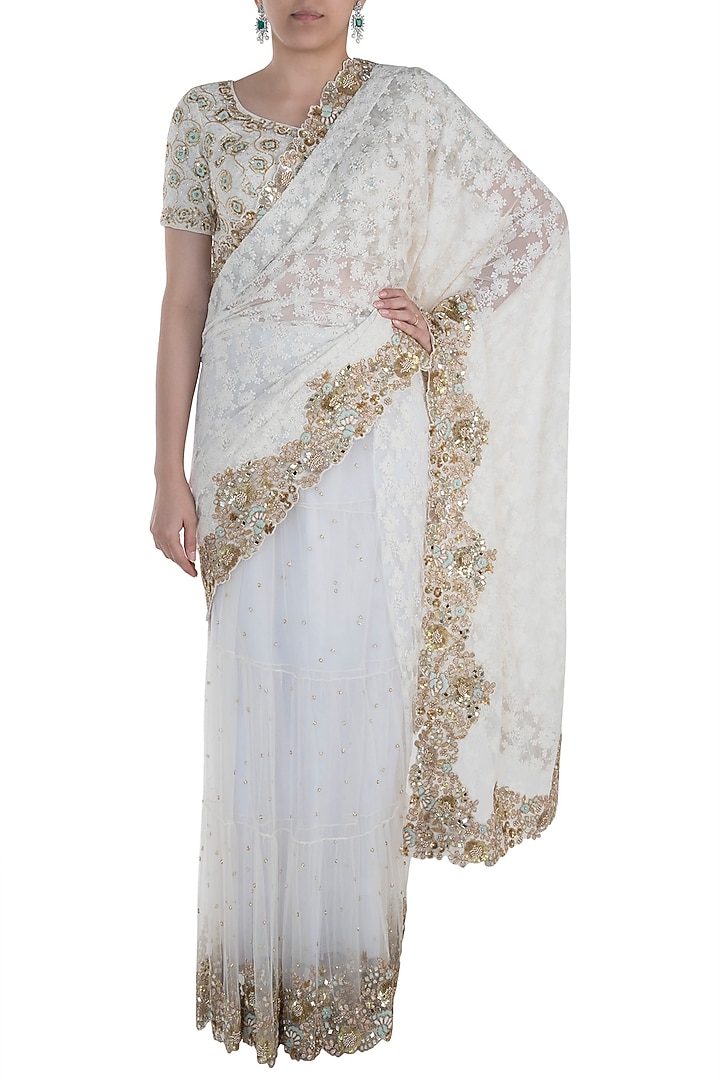 Cream chikankari saree set available only at Pernia's Pop Up Shop.