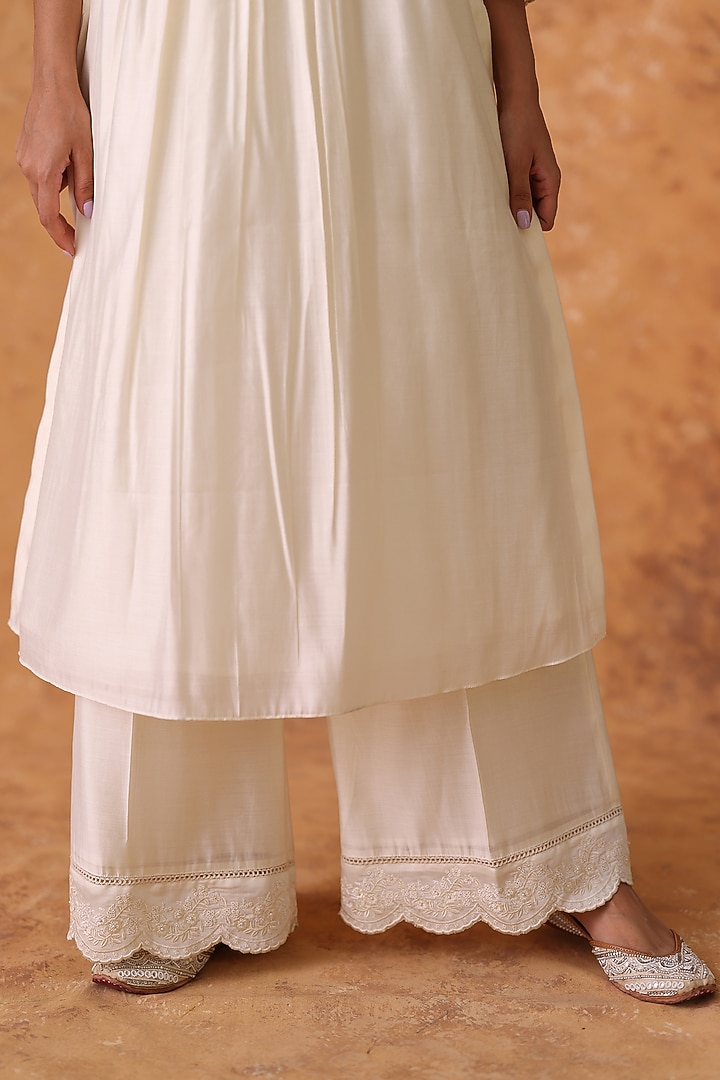 Ivory Chanderi Embroidered Asymmetric Kurta Set by POULI at Pernia's Pop Up Shop