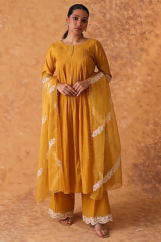 Yellow Chanderi Embroidered Asymmetric Kurta Set by POULI