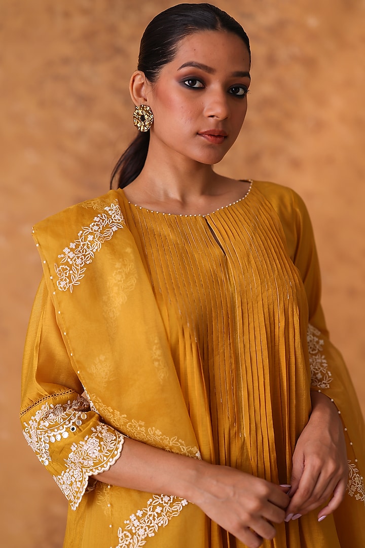 Yellow Chanderi Embroidered Asymmetric Kurta Set by POULI at Pernia's Pop Up Shop