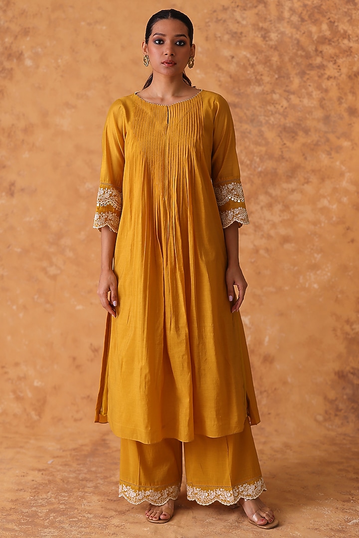 Yellow Chanderi Embroidered Asymmetric Kurta Set by POULI at Pernia's Pop Up Shop