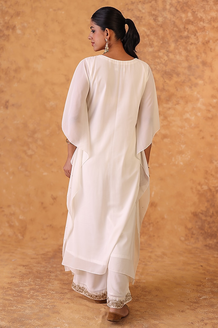 Ivory Georgette Sequins Embroidered Kaftan Set by POULI at Pernia's Pop Up Shop