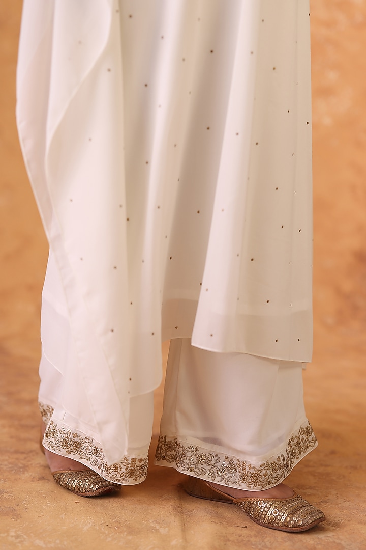 Ivory Georgette Sequins Embroidered Kaftan Set by POULI at Pernia's Pop Up Shop