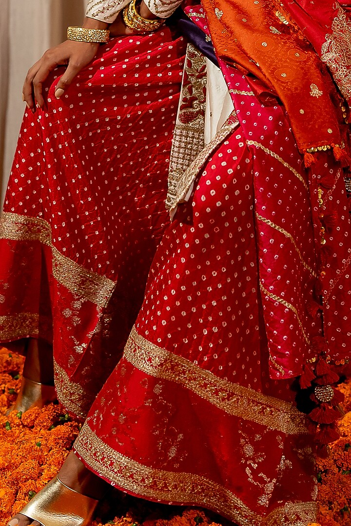 Red Silk Bandhani Wedding Sharara Set by Pooja & Keyur at Pernia's Pop Up Shop