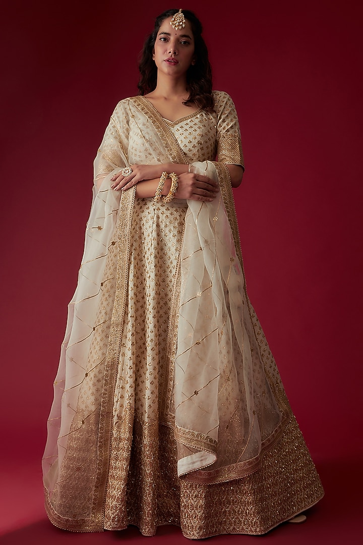 Off-White Raw Silk Embroidered Bridal Lehenga Set by Pooja & Keyur at Pernia's Pop Up Shop