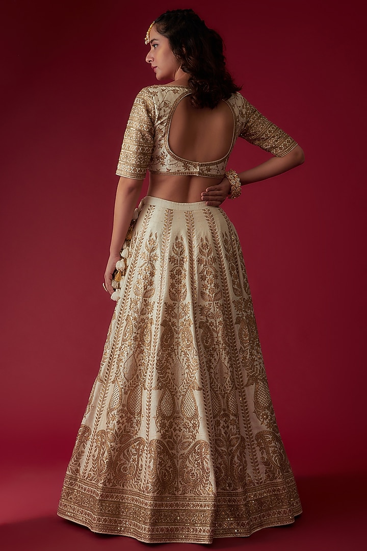 Off-White Raw Silk Embroidered Bridal Lehenga Set by Pooja & Keyur at Pernia's Pop Up Shop