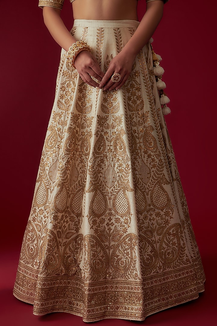 Off-White Raw Silk Embroidered Bridal Lehenga Set by Pooja & Keyur at Pernia's Pop Up Shop