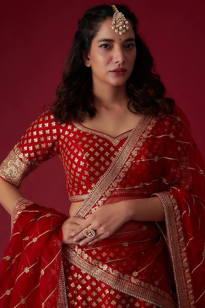 Red Raw Silk Embroidered Bridal Lehenga Set by Pooja & Keyur at Pernia's Pop Up Shop