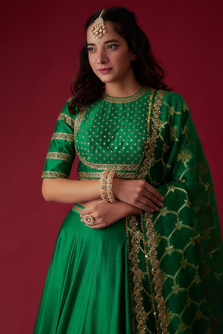 Green Silk Embroidered Bridal Lehenga Set by Pooja & Keyur at Pernia's Pop Up Shop
