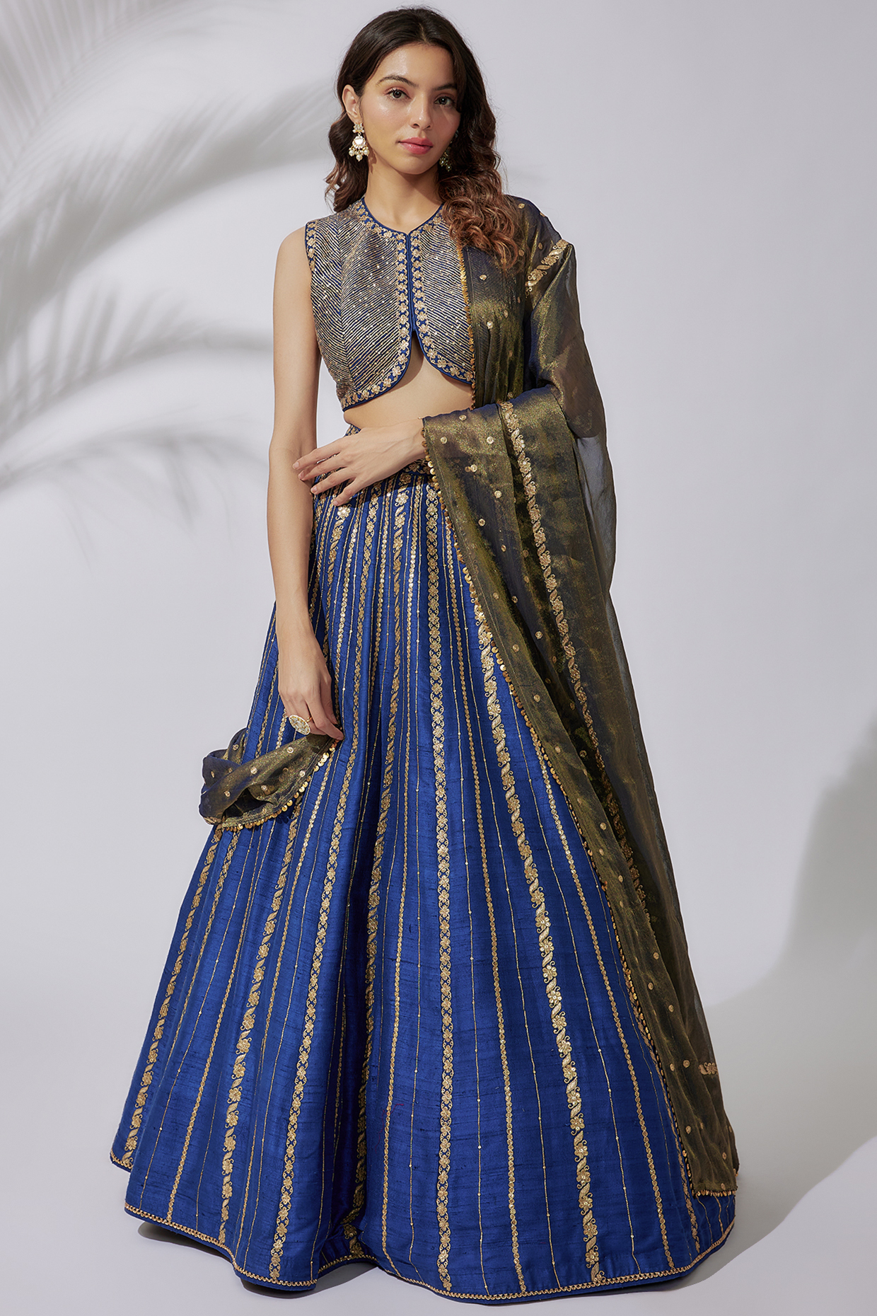 Blue Raw Silk Embroidered Lehenga Set by Pooja & Keyur