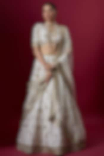 Off-White Raw Silk Embroidered Bridal Lehenga Set by Pooja & Keyur at Pernia's Pop Up Shop