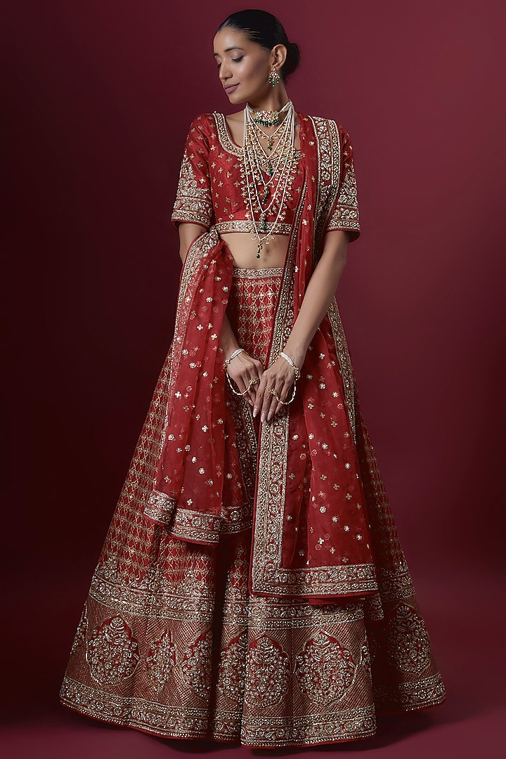 Red Raw Silk Embroidered Bridal Lehenga Set by Pooja & Keyur at Pernia's Pop Up Shop