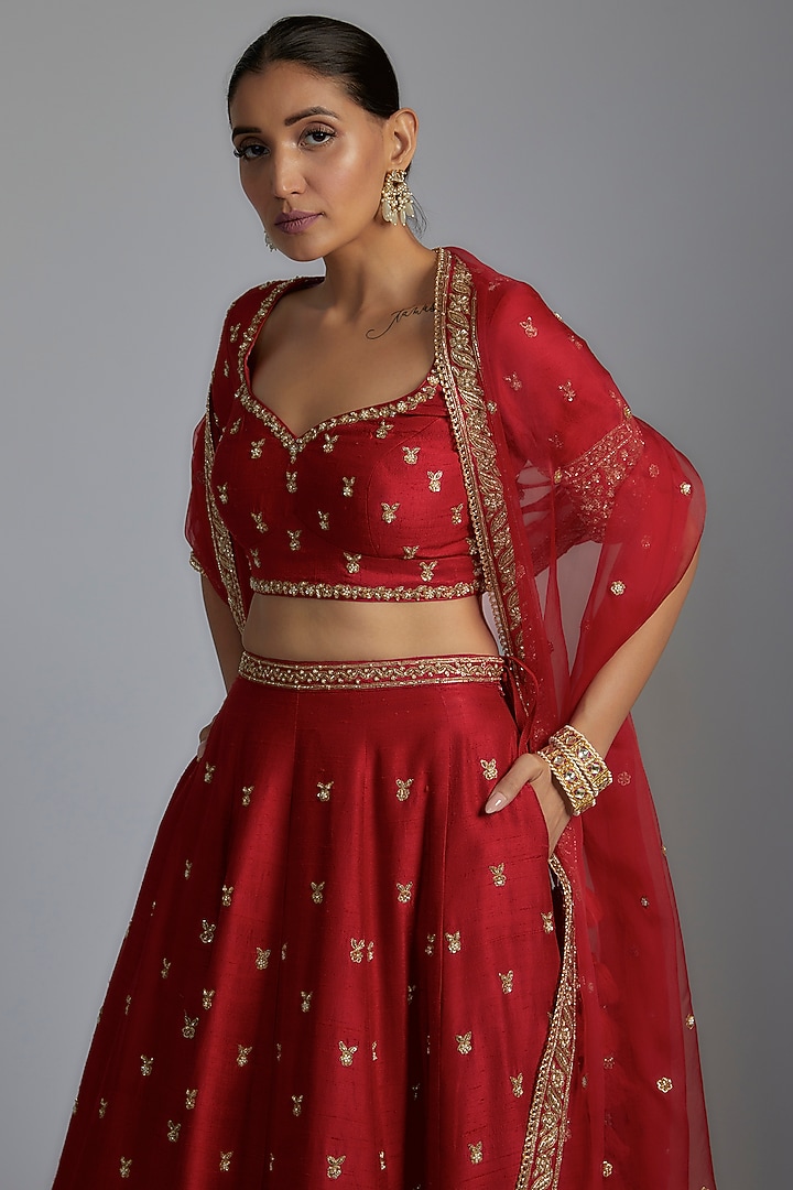 Red Raw Silk Embroidered Bridal Lehenga Set by Pooja & Keyur at Pernia's Pop Up Shop