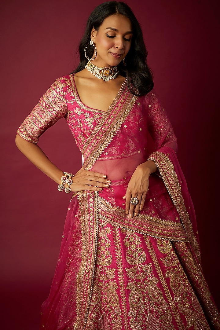 Red Raw Silk Aari Embroidered Bridal Lehenga Set by Pooja & Keyur at Pernia's Pop Up Shop