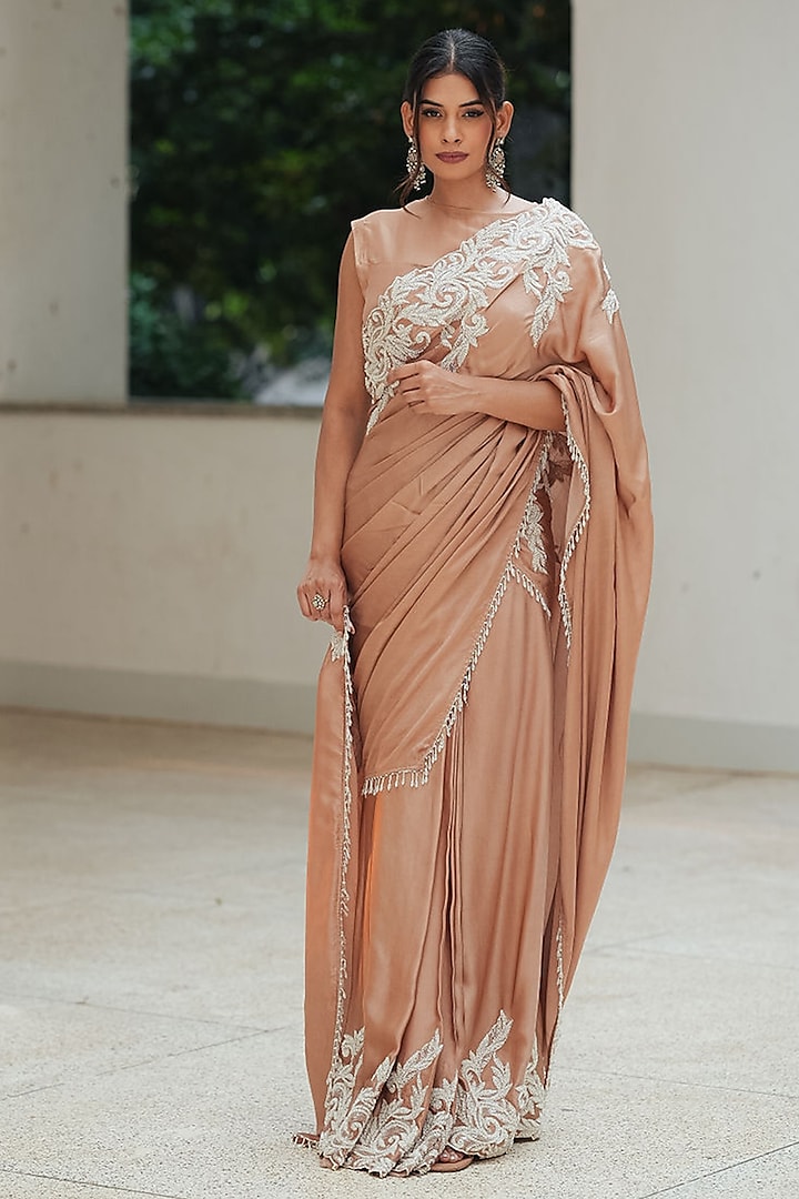 Nude Natural Satin Draped Pleated Skirt Party Wear Saree Set by Pooja Bagaria at Pernia's Pop Up Shop