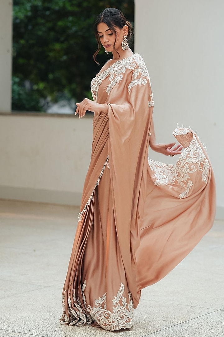 Nude Natural Satin Draped Pleated Skirt Party Wear Saree Set by Pooja Bagaria at Pernia's Pop Up Shop