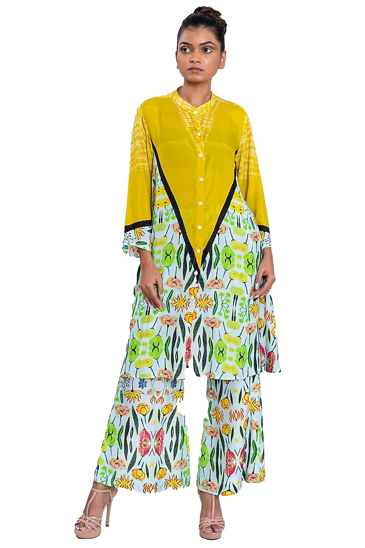 Off-White Bell Pants With Floral Print by Pooja Bagaria at Pernia's Pop Up Shop