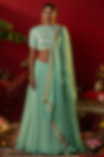 Turquoise Blue Natural Satin Linen Ajrakh Printed Wedding Lehenga Set by Pooja Bagaria at Pernia's Pop Up Shop