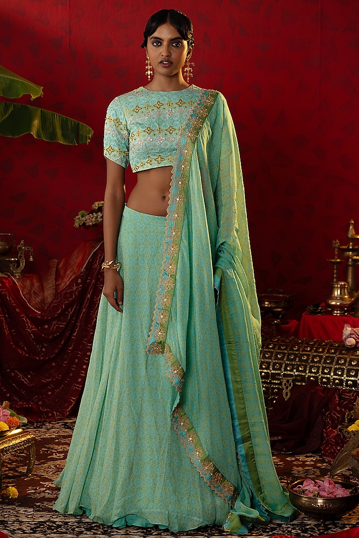 Turquoise Blue Natural Satin Linen Ajrakh Printed Wedding Lehenga Set by Pooja Bagaria at Pernia's Pop Up Shop