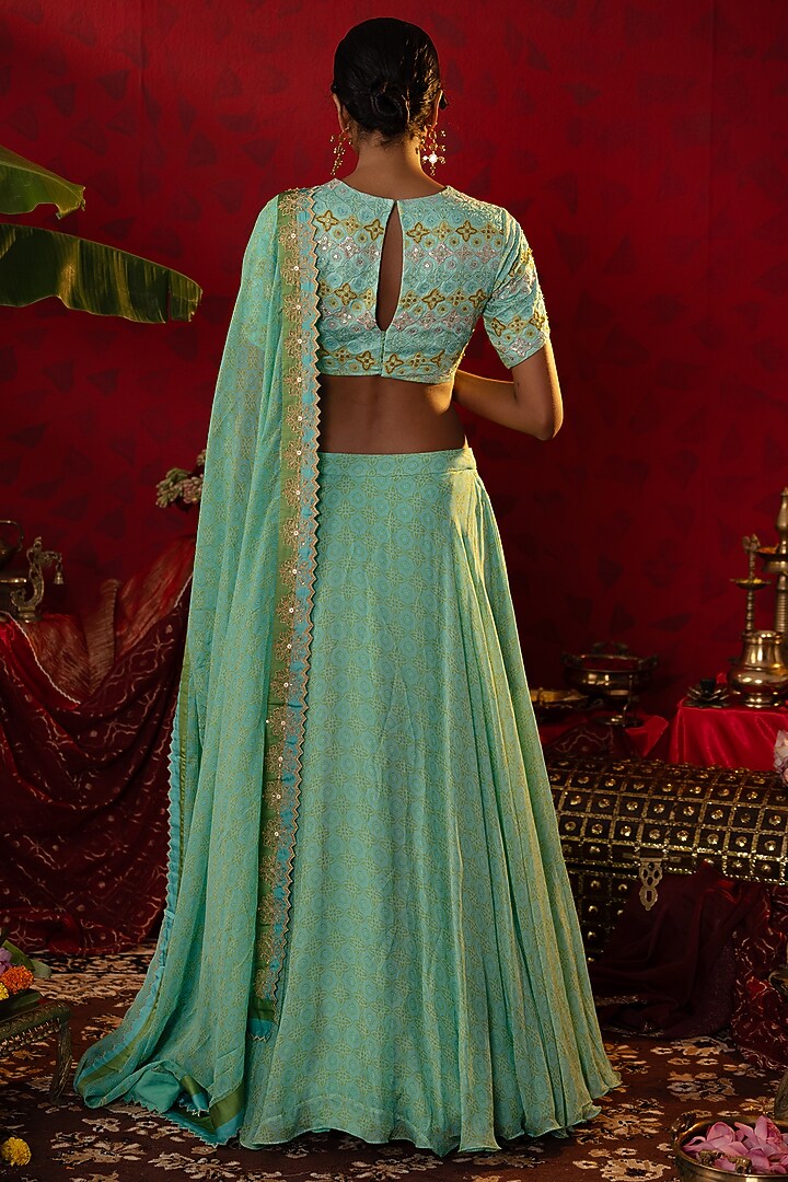 Turquoise Blue Natural Satin Linen Ajrakh Printed Wedding Lehenga Set by Pooja Bagaria at Pernia's Pop Up Shop