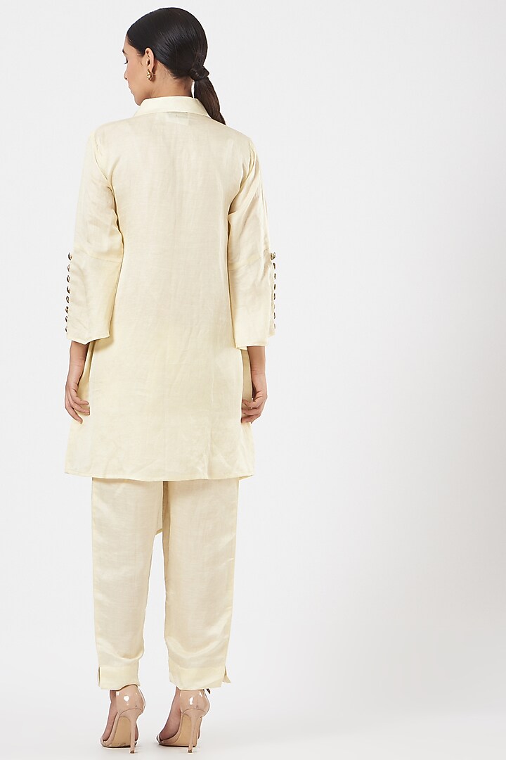Ivory Embroidered Asymmetrical Kurta Set by Poshak apparels at Pernia's Pop Up Shop