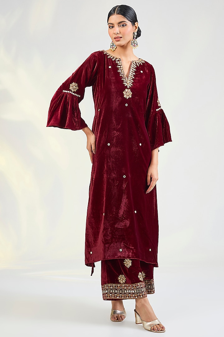 Maroon Velvet Mirror & Zardosi Embroidered Asymmetric Kurta Set by Pouli Pret at Pernia's Pop Up Shop