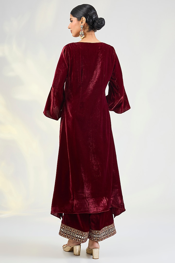 Maroon Velvet Mirror & Zardosi Embroidered Asymmetric Kurta Set by POULI at Pernia's Pop Up Shop