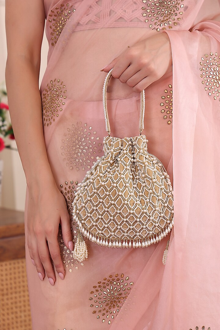 Gold Velvet Embellished Potli by POUT AT NINE at Pernia's Pop Up Shop