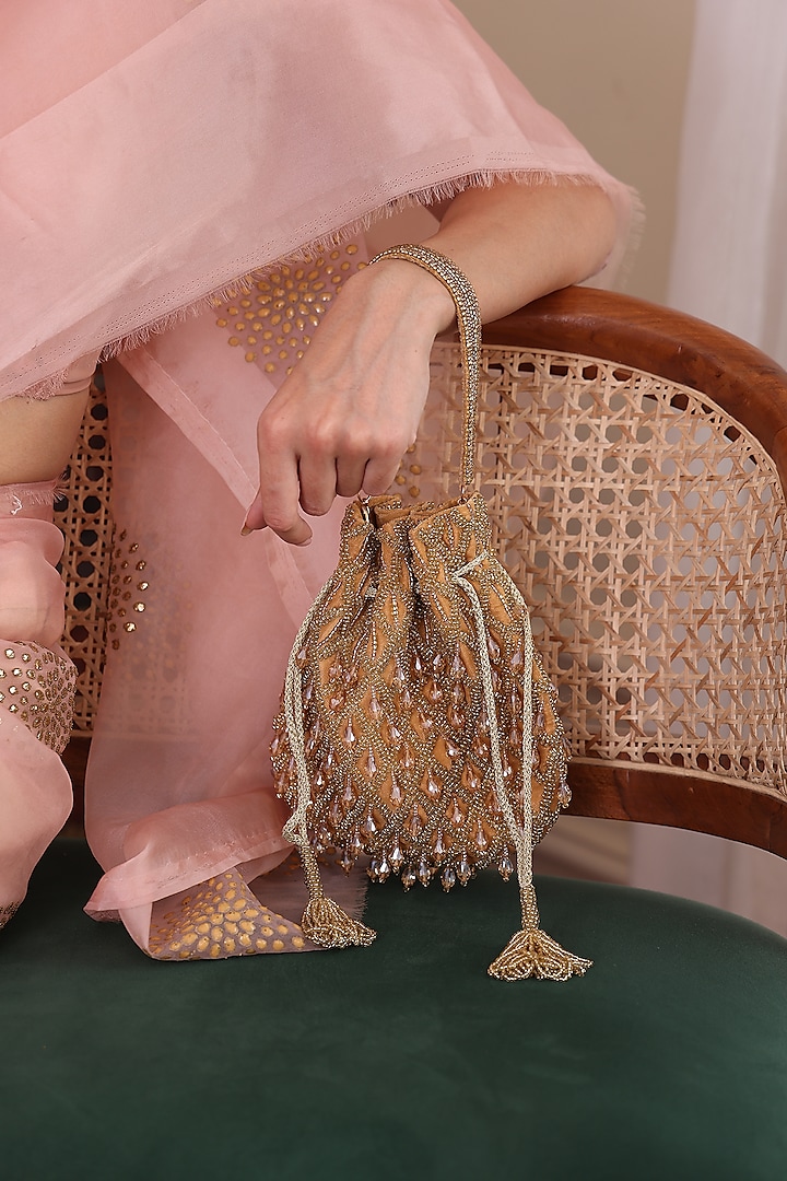 Gold Velvet Embellished Potli by POUT AT NINE at Pernia's Pop Up Shop