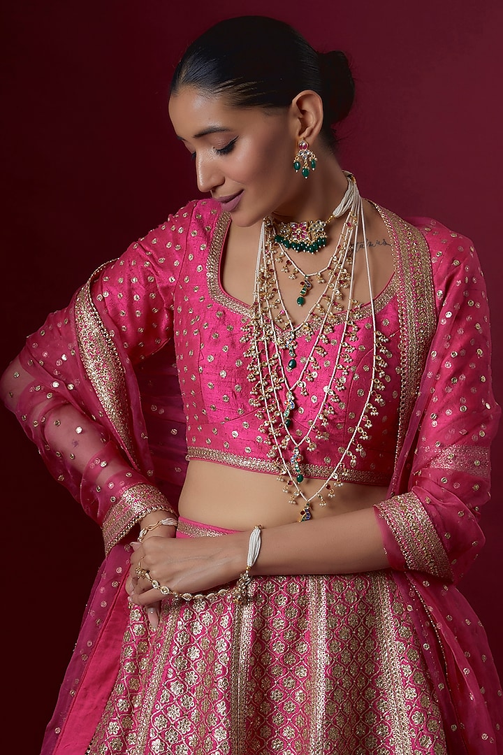 Pink Raw Silk Embroidered Bridal Lehenga Set by Pooja & Keyur at Pernia's Pop Up Shop