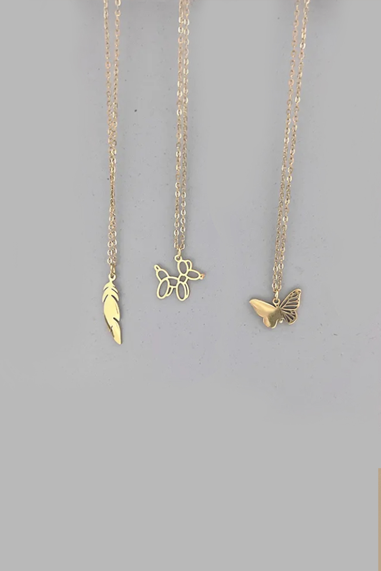 Gold Plated Butterfly, Dog Balloon & Feather Necklace (Set of 3) by Peachy Accessories at Pernia's Pop Up Shop