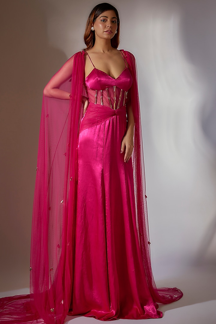 Hot Pink Mashru Silk & Net Embroidered Corset Gown With Cape by MASUMI MEWAWALLA