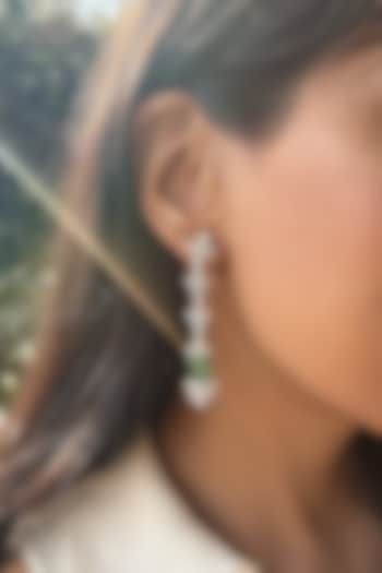 White Finish Motif & Emerald Drop Dangler Earrings In Sterling Silver by PRATA at Pernia's Pop Up Shop