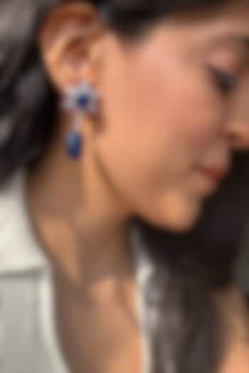 White Finish Diamond & Blue Tumble Dangler Earrings In Sterling Silver by PRATA at Pernia's Pop Up Shop