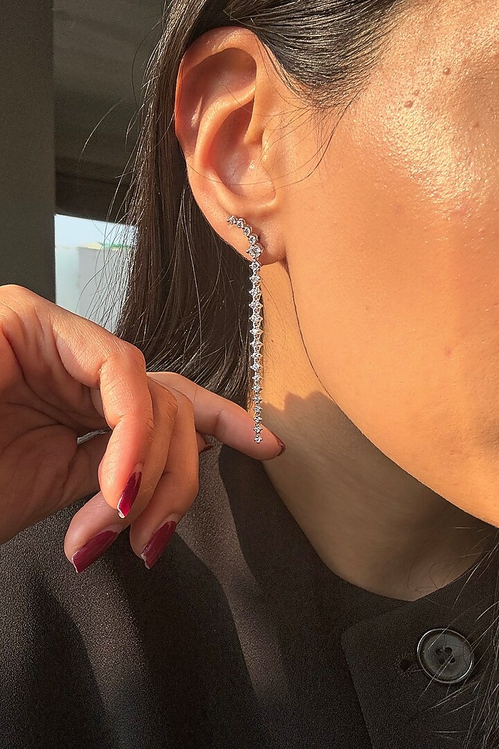 White Finish Diamond Dangler Earrings In Sterling Silver by PRATA at Pernia's Pop Up Shop