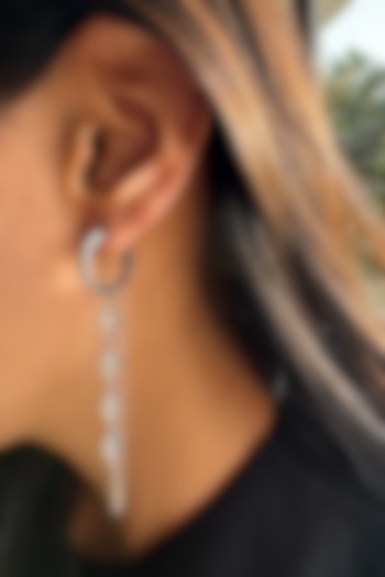 White Finish Diamond Dangler Earrings In Sterling Silver by PRATA at Pernia's Pop Up Shop