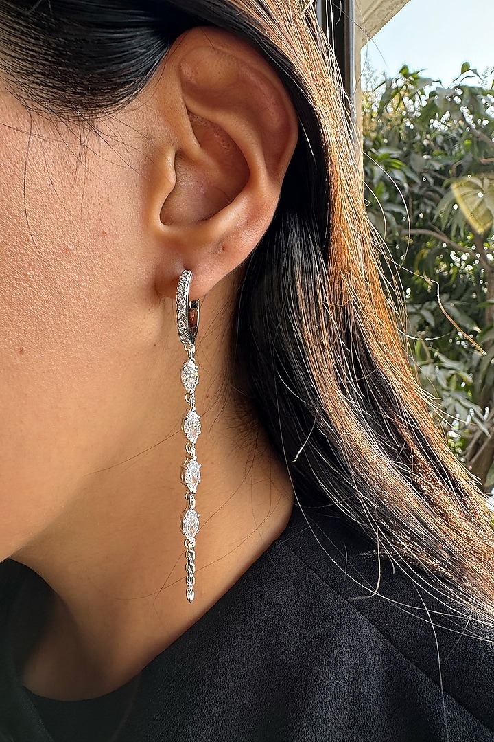 White Finish Diamond Dangler Earrings In Sterling Silver by PRATA at Pernia's Pop Up Shop