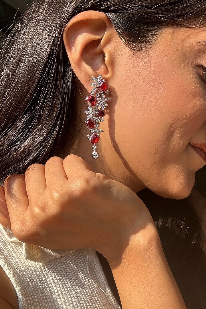 White Finish Red Stone Dangler Earrings In Sterling Silver by PRATA at Pernia's Pop Up Shop