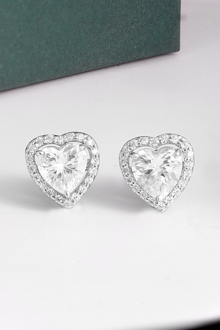 White Finish Cubic Zirconia Heart Stud Earrings In Sterling Silver by PRATA at Pernia's Pop Up Shop