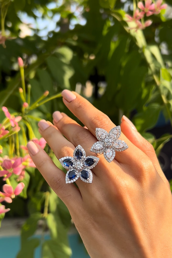 White Finish Pear-Cut Cubic Zirconia & Blue Stone Floral Ring In Sterling Silver by PRATA at Pernia's Pop Up Shop