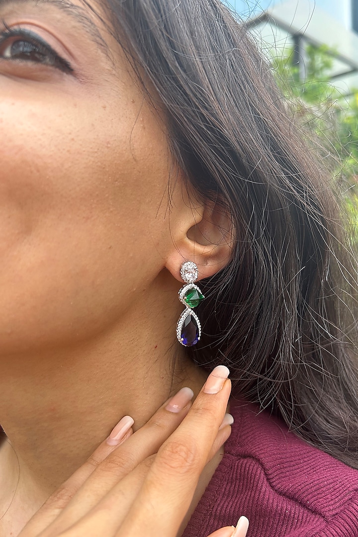 White Finish Oval-Shaped Cubic Zirconia & Blue Pear Drop Stone Dangler Earrings In Sterling Silver by PRATA at Pernia's Pop Up Shop