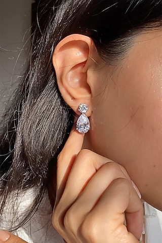 White Finish Solitaire Cubic Zirconia Detachable Teardrop Earrings In Sterling Silver by PRATA