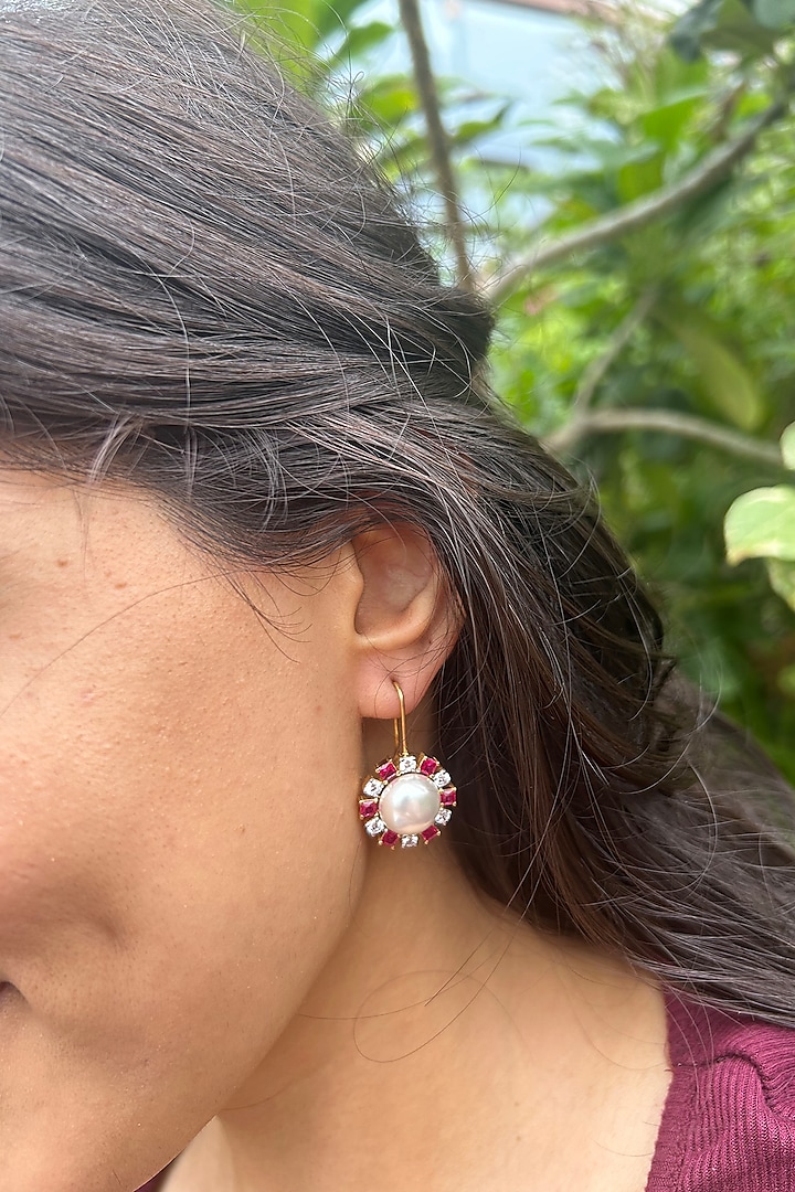 Gold Finish Imported Cubic Zirconia & Red Stone Dangler Earrings In Sterling Silver by PRATA at Pernia's Pop Up Shop