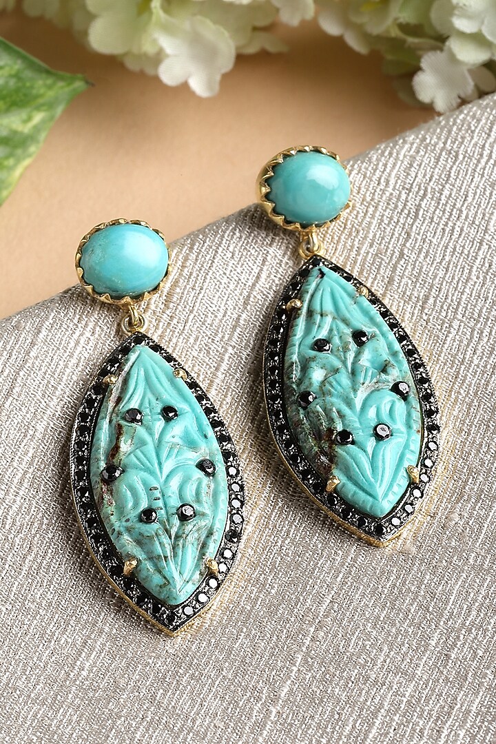 Gold Finish Carved Turquoise Stone Dangler Earrings In Sterling Silver by Jewels by Praccessorii at Pernia's Pop Up Shop