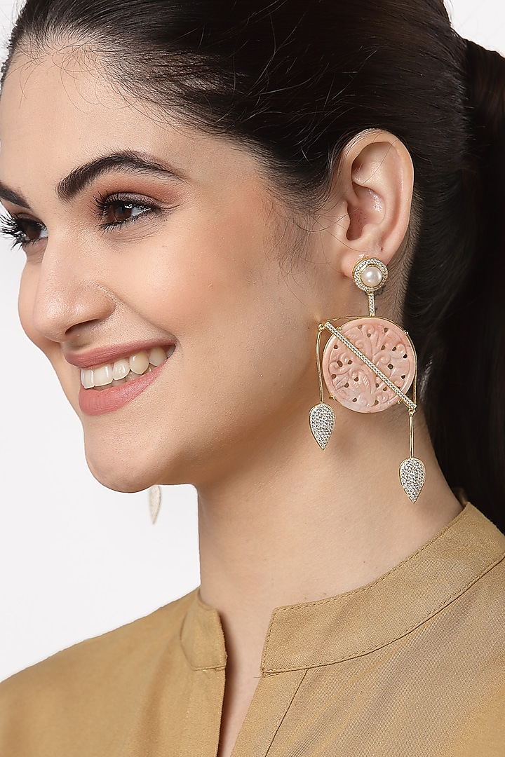 Gold Finish Carved Pink Opal & Pearl Dangler Earrings In Sterling Silver by Jewels by Praccessorii at Pernia's Pop Up Shop